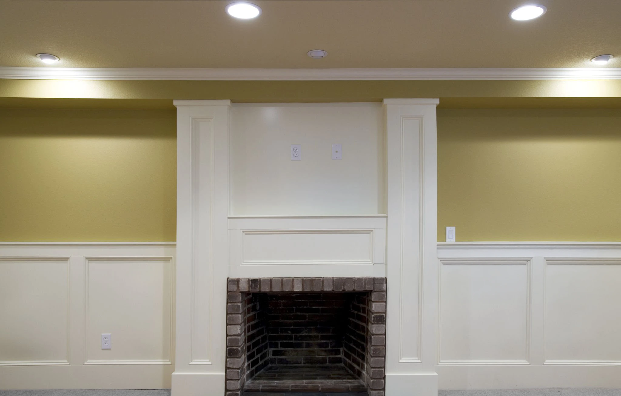 Masonry fireplace or fire feature with detailed stone installation