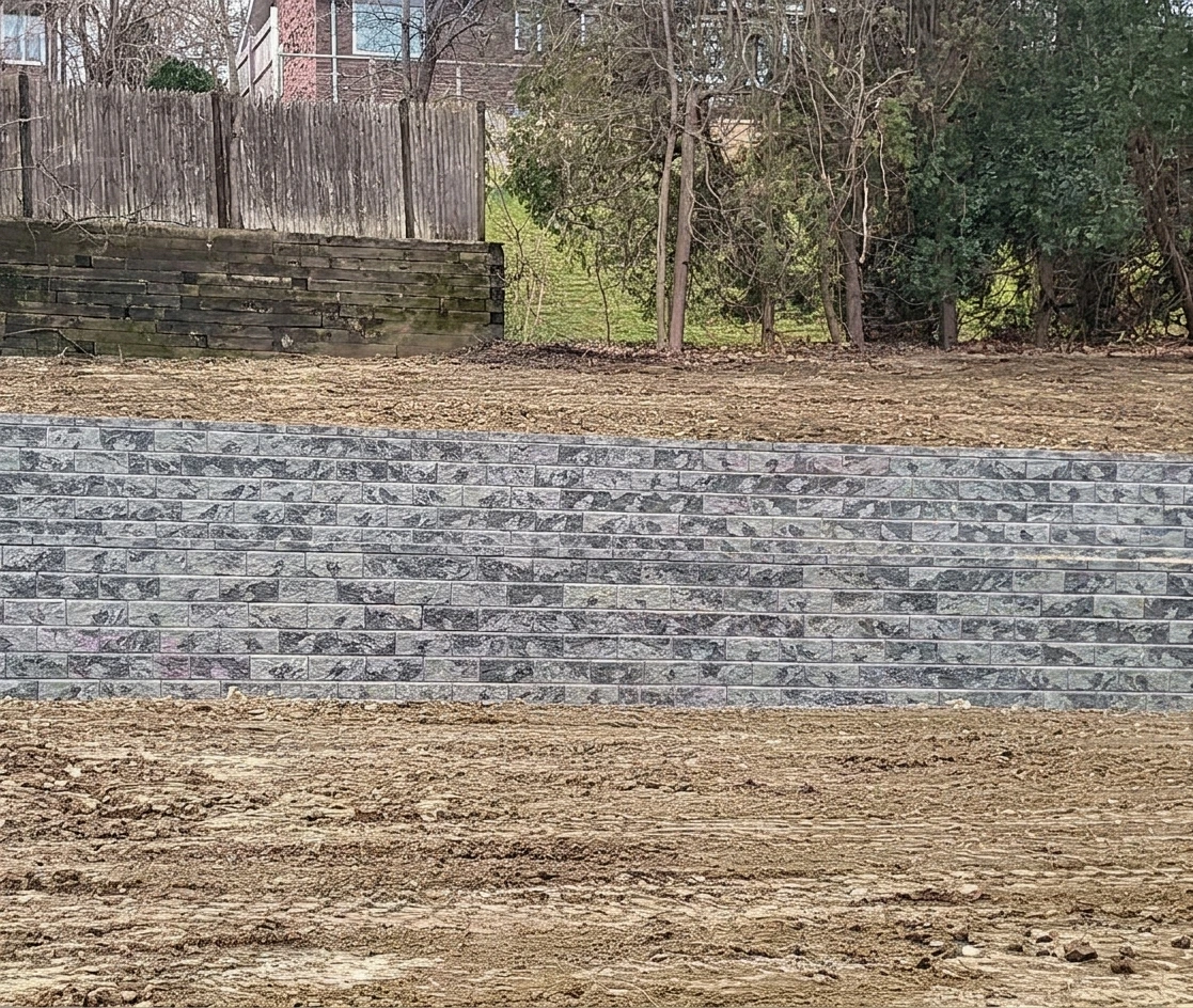 Retaining wall stonework and construction