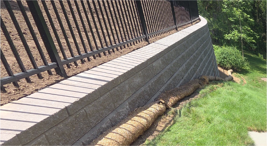 Stone retaining wall included in masonry work in Massachusetts