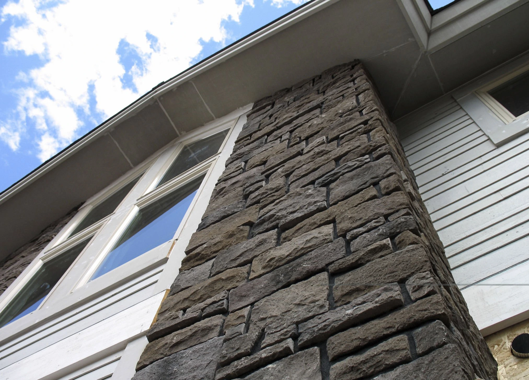 Stone veneer and outdoor fire feature masonry