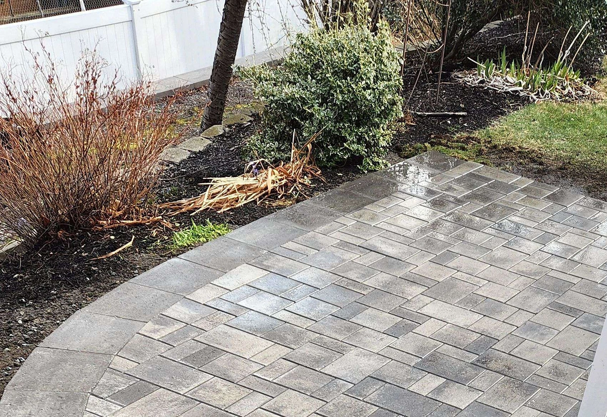 Masonry construction example showing patio improvements for usable outdoor space